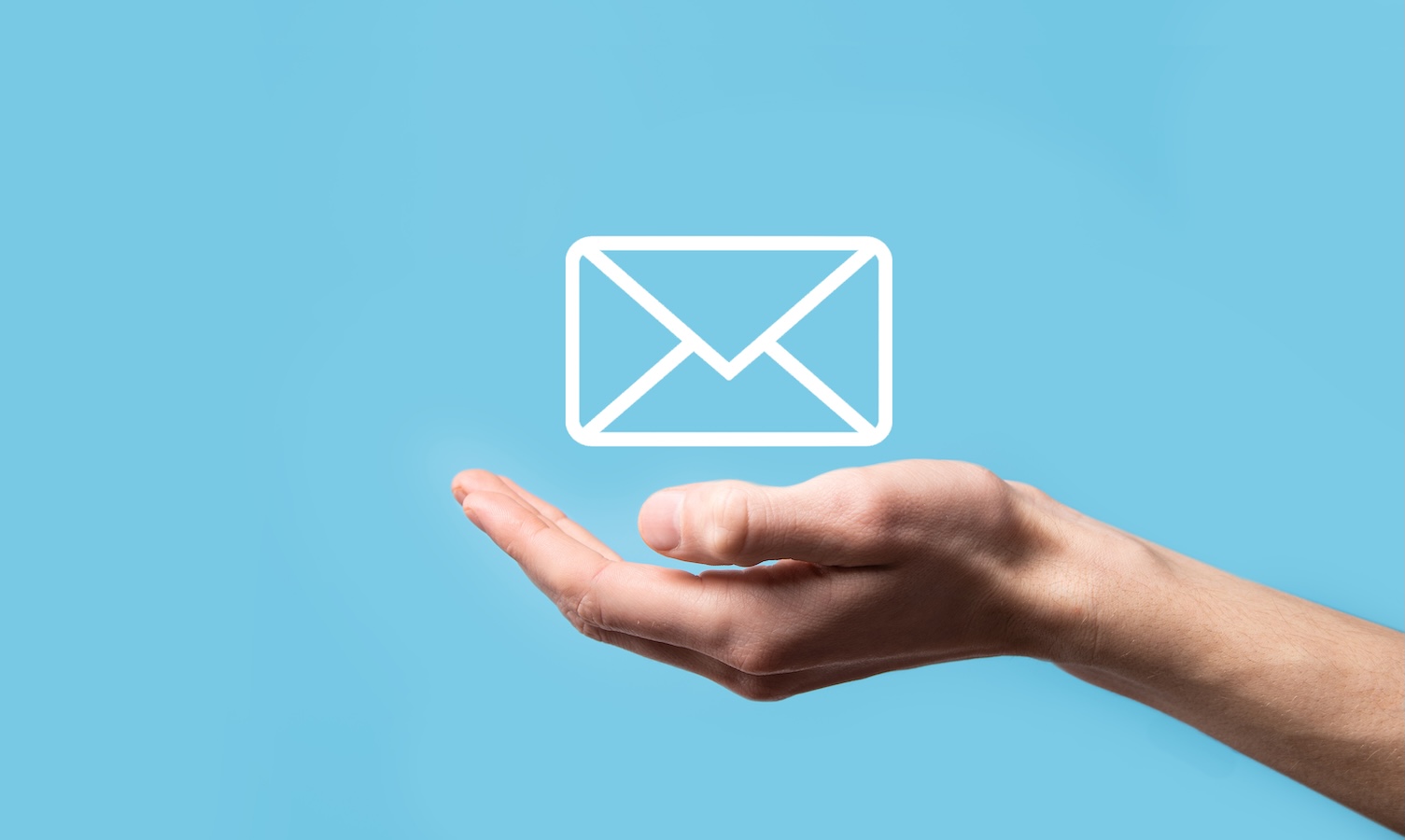 Male hand holding letter icon,email icons .Contact us by newsletter email and protect your personal information from spam mail. Customer service call center contact us.Email marketing and newsletter