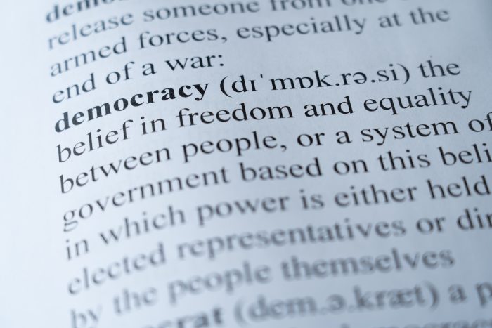 A dictionary page with the word democracy 