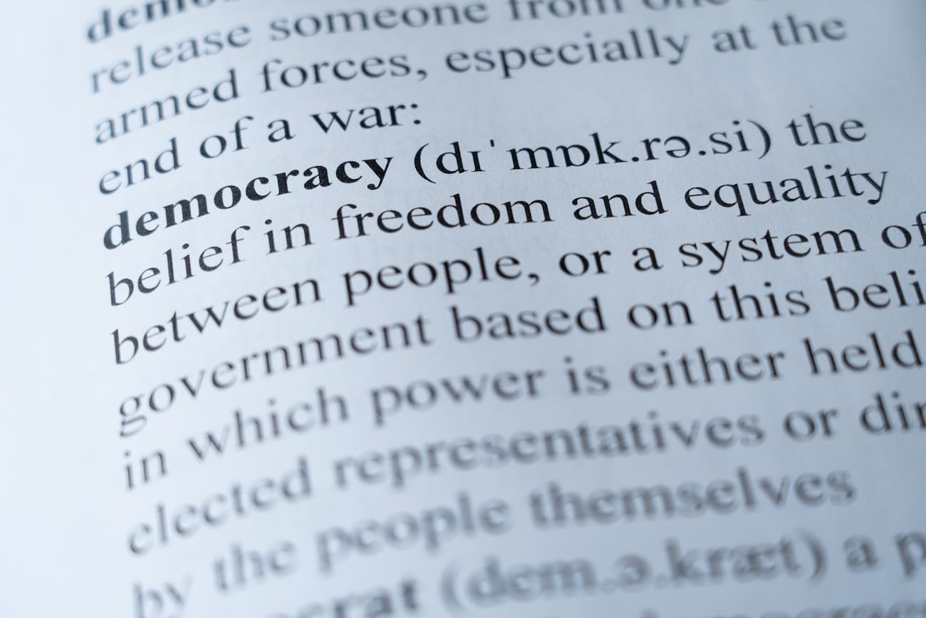 A dictionary page with the word democracy